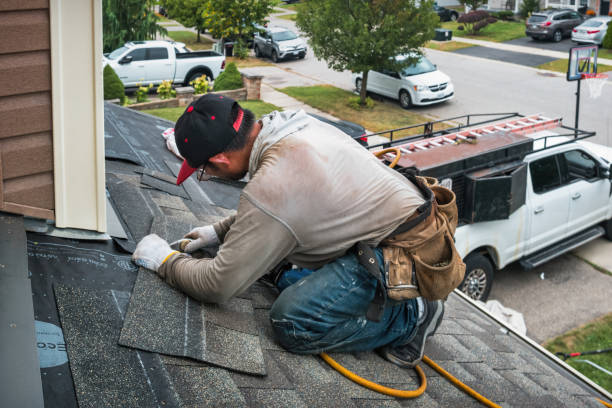 Professional Roof Replacement technician working in Hillsborough, CA